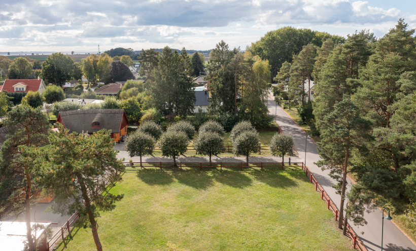 Fastigheten är i nedre del av bild. 